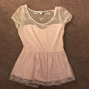 Pink flowy shirt with bow design